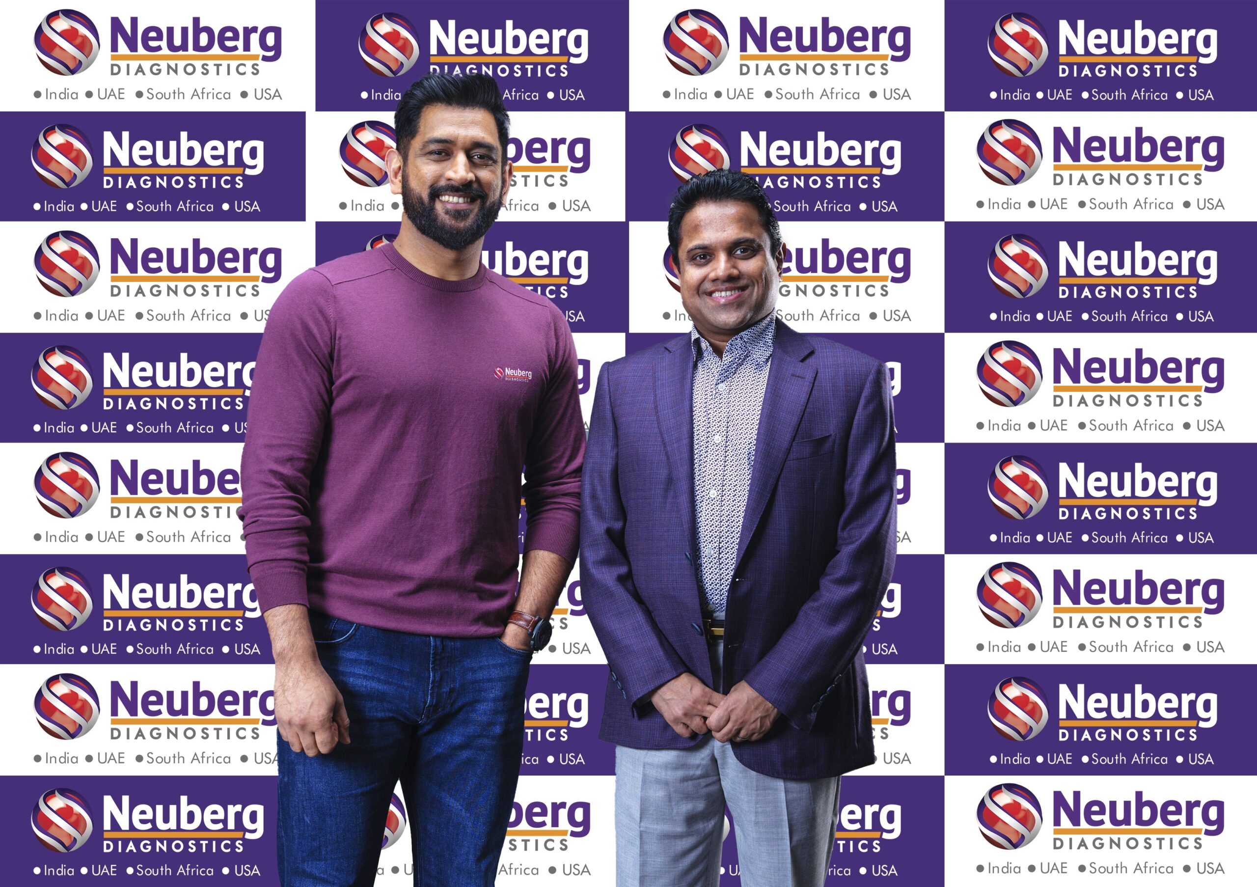 Dr. GSK Velu, Chairman and Managing Director, Neuberg Diagnostics, with brand ambassador Ms Dhoni